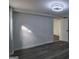 Finished basement featuring gray wood-look flooring and white walls at 1772 Martin Se Pl, Smyrna, GA 30080