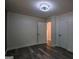 Spacious bedroom with wood-look floors and two closets at 1772 Martin Se Pl, Smyrna, GA 30080