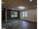 Bright living room featuring wood floors and lots of natural light at 1772 Martin Se Pl, Smyrna, GA 30080