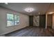 Bright living room featuring wood floors and lots of natural light at 1772 Martin Se Pl, Smyrna, GA 30080