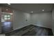 Spacious room features modern wood-look floors and neutral paint ready for your updates at 1772 Martin Se Pl, Smyrna, GA 30080