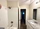 Clean bathroom showing the white tiled shower, granite vanity and newer fixtures at 2860 Lynda Pl, Decatur, GA 30032