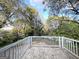 Elevated wood deck overlooking a lush, wooded backyard at 2860 Lynda Pl, Decatur, GA 30032