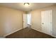Bedroom featuring neutral walls, carpet, and a single window at 614 Tramore Ct, Stockbridge, GA 30281
