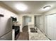 The kitchen features modern appliances, a stainless steel fridge, and granite countertops at 614 Tramore Ct, Stockbridge, GA 30281