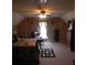 Spacious bedroom featuring neutral paint, ceiling fan, and ensuite bath at 141 Windward Hills, Mcdonough, GA 30253