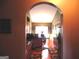 Kitchen with dark wood cabinets and a view into the dining area at 141 Windward Hills, Mcdonough, GA 30253
