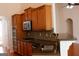 Modern kitchen featuring granite countertops, stainless steel appliances, and ample counter space, ideal for entertaining at 141 Windward Hills, Mcdonough, GA 30253