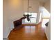 Bright living room featuring a brick fireplace, hardwood floors, and a large window with natural light at 141 Windward Hills, Mcdonough, GA 30253