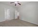 Comfortable carpeted bedroom with neutral tones, offering versatility and charm at 385 Orchard Land, Covington, GA 30014
