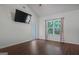 Bright bedroom featuring a large window and a glass panel door with outdoor access at 385 Orchard Land, Covington, GA 30014