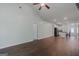 Spacious living room with hardwood floors and access to the kitchen and entry at 385 Orchard Land, Covington, GA 30014