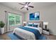 Well decorated main bedroom with a large window and modern ceiling fan at 385 Orchard Land, Covington, GA 30014