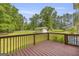 This back deck overlooks the spacious backyard at 6023 Highway 20 S, Covington, GA 30016