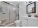 Modern bathroom with glass shower enclosure and a white vanity at 6023 Highway 20 S, Covington, GA 30016
