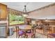 Eat in Kitchen featuring window views of backyard at 6023 Highway 20 S, Covington, GA 30016