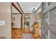 Welcoming foyer with hardwood floors, decorative door, and a glimpse into the dining room, creating a warm entry at 6023 Highway 20 S, Covington, GA 30016