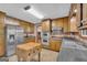 Kitchen features stainless steel appliances, and wood cabinetry at 6023 Highway 20 S, Covington, GA 30016