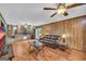Open concept living room with a half-wall showcasing the kitchen and eat-in area at 6023 Highway 20 S, Covington, GA 30016