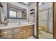 Main bathroom boasts a single vanity and full tub shower combination at 6023 Highway 20 S, Covington, GA 30016