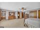 This spacious main bedroom boasts a private entrance to the main bathroom, large windows and ample closet space at 6023 Highway 20 S, Covington, GA 30016