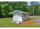 A storage shed is perfect for a workshop or outdoor equipment at 6023 Highway 20 S, Covington, GA 30016