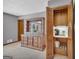 This wardrobe with louvered doors has a beverage station with outlets and a light, perfect for a coffee bar at 6023 Highway 20 S, Covington, GA 30016