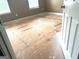 Bright bedroom featuring two windows and a door at 9515 Lakeview Rd, Union City, GA 30291