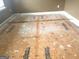 Image of subfloor, ready for new flooring installation in a room with natural light at 9515 Lakeview Rd, Union City, GA 30291