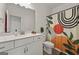 Stylish bathroom featuring a modern vanity, contemporary fixtures, and decorative shower curtain at 5350 Woodline View Cir, Hoschton, GA 30548