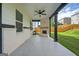 Covered patio with brick fireplace for outdoor enjoyment at 5350 Woodline View Cir, Hoschton, GA 30548