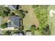 Aerial view of property with large backyard and golf course near neighboring houses at 719 Bethpage Dr, Mcdonough, GA 30253