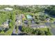 Aerial view showcasing community amenities: pool, tennis courts, parking and beautifully landscaped surroundings at 719 Bethpage Dr, Mcdonough, GA 30253