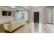 Inviting foyer with decorative front door and sidelights, flows into bright living space at 719 Bethpage Dr, Mcdonough, GA 30253