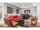 Finished basement game room features a pool table, stained concrete floors, seating, bar and a TV at 719 Bethpage Dr, Mcdonough, GA 30253