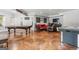 Finished basement game room features a pool table, stained concrete floors, seating and an air hockey table at 719 Bethpage Dr, Mcdonough, GA 30253