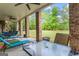 Covered patio with ceiling fan and outdoor seating area, great for entertaining and enjoying the backyard at 719 Bethpage Dr, Mcdonough, GA 30253