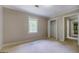 Bedroom with a closet and open door leading to bathroom at 1201 Justin Ln, Lithonia, GA 30058