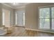 Inviting entryway with updated flooring and natural light, showcasing the home's welcoming ambiance at 1201 Justin Ln, Lithonia, GA 30058
