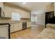 Bright kitchen features stainless steel appliances, granite counters and ample storage at 1201 Justin Ln, Lithonia, GA 30058