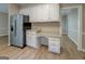 Bright kitchen features stainless steel appliances, granite counters and built-in desk at 1201 Justin Ln, Lithonia, GA 30058