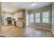 Bright kitchen featuring stainless steel appliances, granite counters and a breakfast area at 1201 Justin Ln, Lithonia, GA 30058