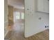 Laundry room features ample storage, wood floors and washer/dryer hookups at 1201 Justin Ln, Lithonia, GA 30058