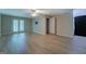 Living room with ceiling fan and access to the exterior at 1201 Justin Ln, Lithonia, GA 30058