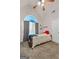 Bedroom featuring large window and arched transom allowing natural light at 235 Surrey Park Dr, Fayetteville, GA 30215