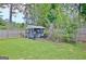 Spacious backyard with a fenced perimeter, shed, and lush green lawn at 170 Habersham Dr, Fayetteville, GA 30214