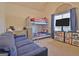 Bedroom with bunk beds, TV, and large window at 170 Habersham Dr, Fayetteville, GA 30214