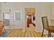 A formal doorway leads into a bedroom with a four poster bed and traditional wooden furniture at 170 Habersham Dr, Fayetteville, GA 30214