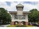 The Fayette Pavillion entrance tower has brick accents, greenery, and clear signage at 170 Habersham Dr, Fayetteville, GA 30214