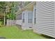 Exterior featuring a wooden fence, a garden and a tree at 170 Habersham Dr, Fayetteville, GA 30214